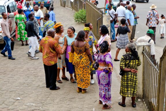 Locals Gathering Outside for Sunday Mass Sunday mass at the Church of St. Michael Nkembo, Libreville