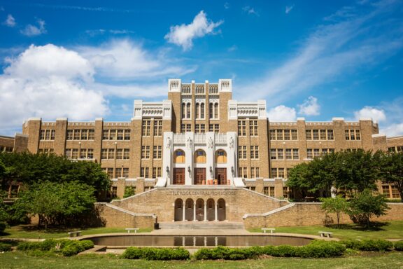 Facade of Little Rock Central High School under a Clear Blue Sky A view of the front of Little Rock Central High School, located in Pulaski County, Arkansas.