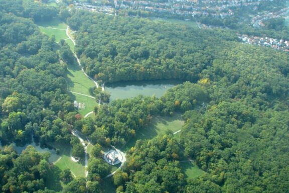 Aerial View of a Lush Green Park with Lake Aerial view of Maksimir Park