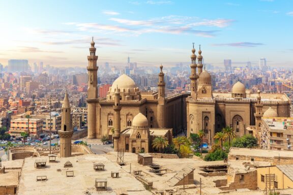 Historic Mosque and Cityscape at Sunset The mosque madrassa of sultan hassan and the city in the