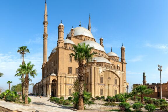 Mosque with Twin Minarets and Domes Against Blue Sky The Great Mosque of Muhammad Ali Pasha inside the walls of the Cairo Citadel