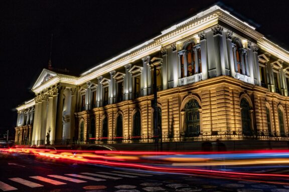 Illuminated National Palace at Night with Traffic Streaks National Palace in San Salvador at night