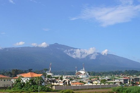 View of Pico Basile on Bioko Island with Clouds Pico Basilé Mountain behind the city of Malabo