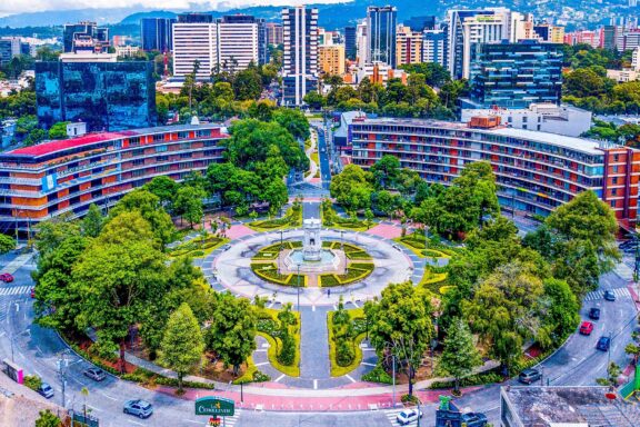 Aerial View of a Colorful City Plaza with Fountain Aerial view of the monumental fountain in the Plaza España