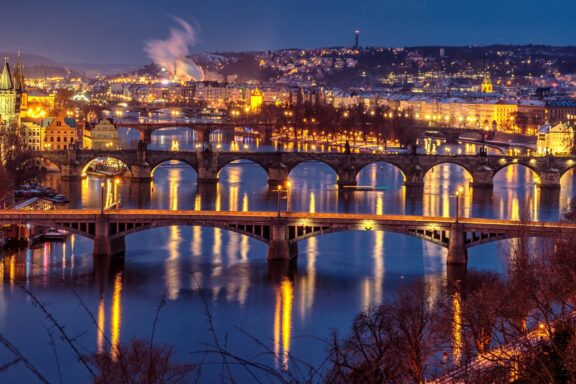 Bridges along the Vltava River In Prague at dusk