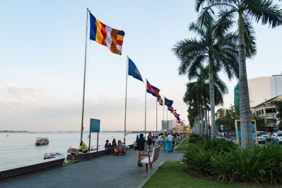 Flags and People at Riverside Park in Phnom Penh Riverside Park is located on the banks of the Tonle Sap River