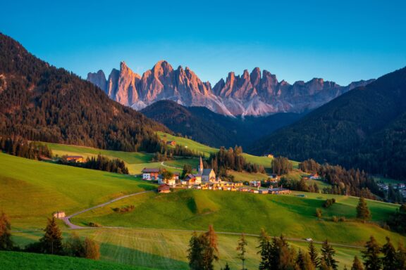 The village of Santa Magdalena in South Tyrol can be seen at sunset.