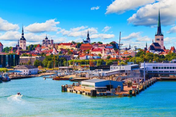 Sunny Day at Tallinn Port Scenic summer view of the Port and in front of the Old Town architecture in Tallinn.