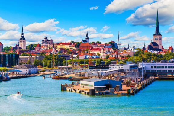 Scenic summer view of the Port and in front of the Old Town architecture in Tallinn.