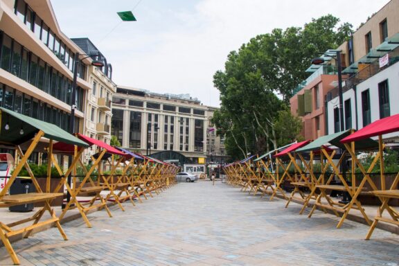 Open-air market setup with empty stalls Stands in the Tbilisi Open Air Market (Dry Bridge Market)