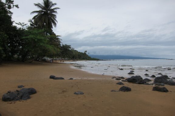 Cloudy Day at a Rocky Tropical Beach Beaches with volcanic rock formations near Ureka Region