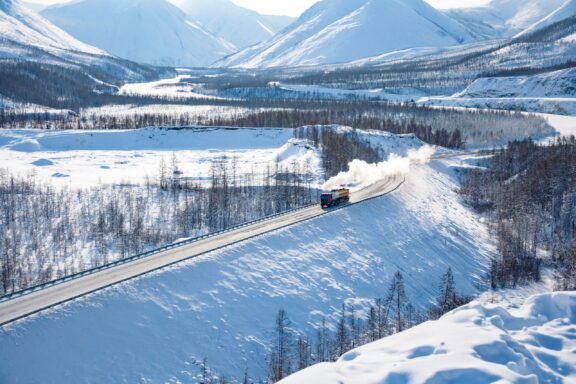 Scenic winter landscape of Kolyma Highway with the amazing Verkhoyansk mountain Range in the background.