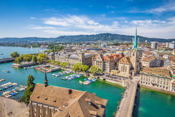 The Limmat River flows through the historic center of Zurich, Switzerland. 