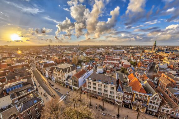 An aerial view of the city of Groningen in the Netherlands near sunset. 