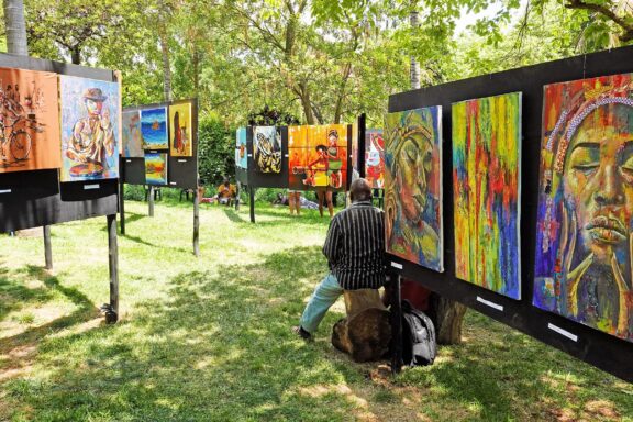 Visitor Viewing Outdoor Art Exhibition in Park Art in the Park festival held inside the Four Gardens in Lilongwe