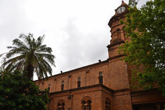 Cathedral with Clock Tower and Palm Tree Sacred Heart Cathedral in Bamako