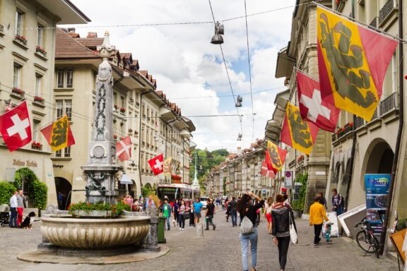 Pedestrians stroll through Kornhausplatz