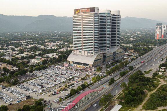 Aerial View of Centaurus Mall in Islamabad with Parking Lot and Surrounding Area The Centaurus Mall, situated in the upscale neighborhood of F-8