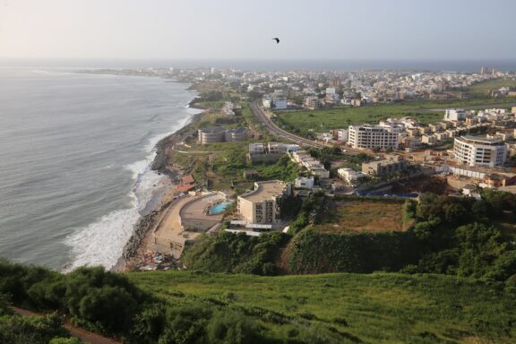 Coastal Cityscape with Beach and Buildings La Pointe des Almadies area along the coastline of Dakar