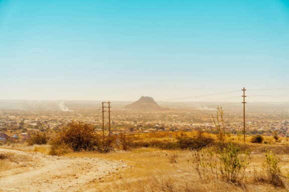 Dusty Landscape with Distant Mountain in Dodoma View of Dodoma City at the Hill Side