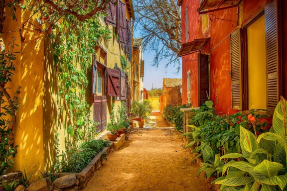 Colorful Alleyway on Gorée Island Gorée Island known worldwide for its role in the transatlantic slave trade