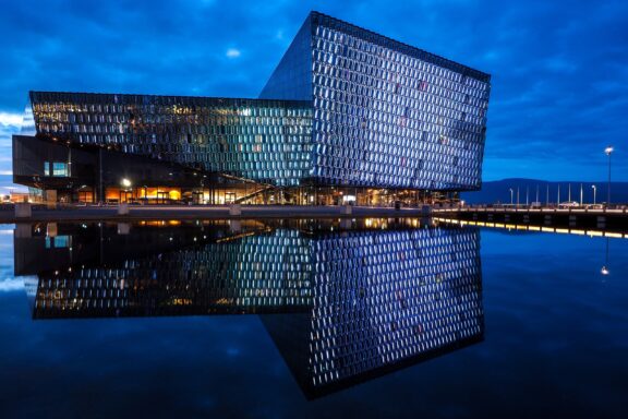 Harpa Concert Hall at Night with Reflection on Water Harpa Concert Hall opened to the public in 2011
