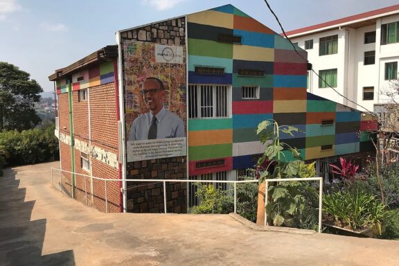 Colorful Mural on Urban Building Facade Inema Art Center, serving as a collaborative education center