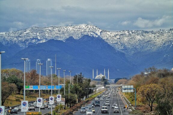 Islamabad Cityscape with Snow-Capped Mountains in the Background Islamabad landscape with mountains in the background