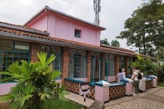 Visitors Outside Pink Museum Building The Kandt House Museum in Kigali, named after the first colonial governor of Rwanda, Richard Kandt