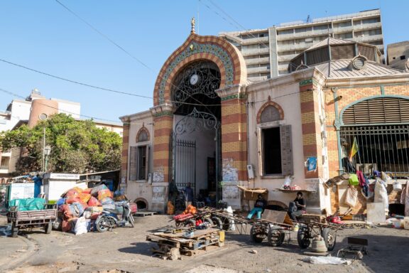 Street Market in Front of Traditional Building he Kermel Market, situated in a beautiful colonial building that dates back to the end of the 19th century