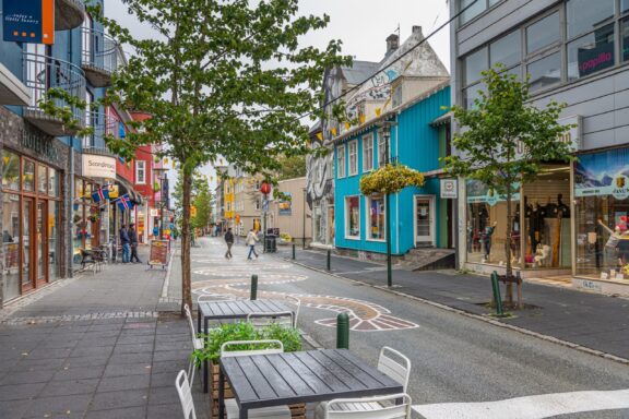 Colorful Street in Reykjavik with Pedestrians Laugavegur Street, the microcosm of Reykjavik's diversity