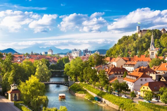 Cityscape of Ljubljana with Ljubljanica River in the foreground