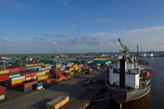 Shipping Vessel at Monrovia Port with Cargo Containers Port of Monrovia, Liberia's largest and primary seaport
