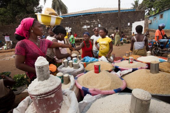 Street Vendor Selling Grains in Monrovia Local woman selling various grains on the streets of Monrovia