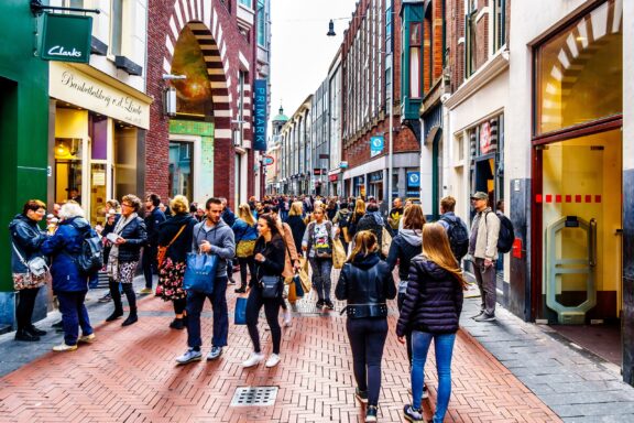 Pedestrians stroll through Nieuwendijk