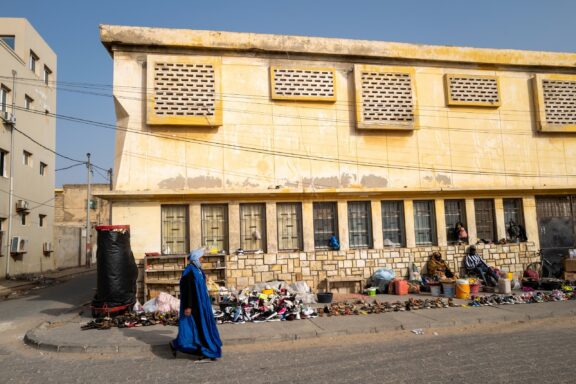 Street Scene with Old French Colonial Building in Dakar Old French colonial buildings on the streets of Dakar