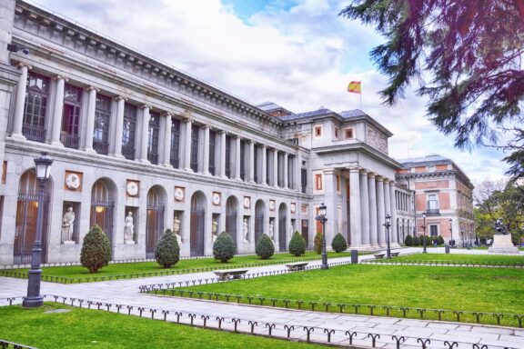 Exterior View of the Prado Museum with Trees The Prado Museum, officially opened in 1819