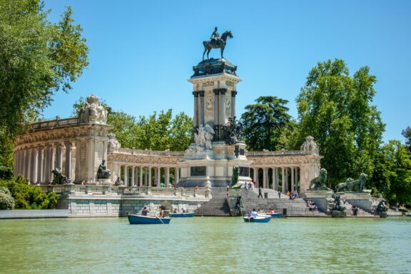 Monument by the Lake in Retiro Park, Madrid Monument of King Alfonso XII in Estanque Grande del Retiro (The Large Pond)