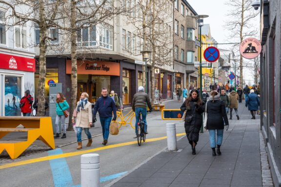 Locals commute on one of the busiest streets in Reykjavik
