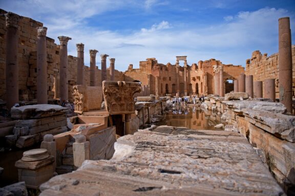 Ancient Ruins Under Blue Sky Leptis Magna, the birthplace of Roman Emperor Septimius Severus