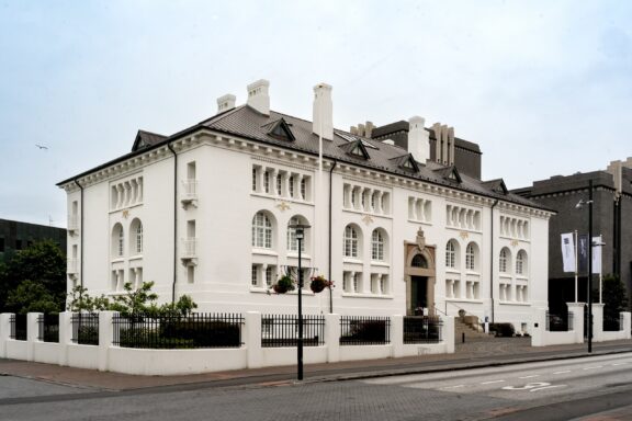 White Historical Building in Reykjavik Safnahúsið, one of the oldest buildings in Reykjavik