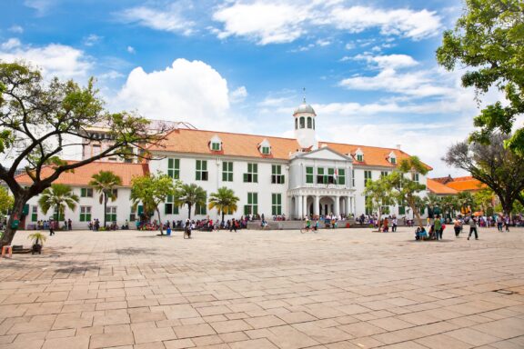 Colonial Building Turned Museum with Visitors in Courtyard Sejarah History Museum in Kota Tua