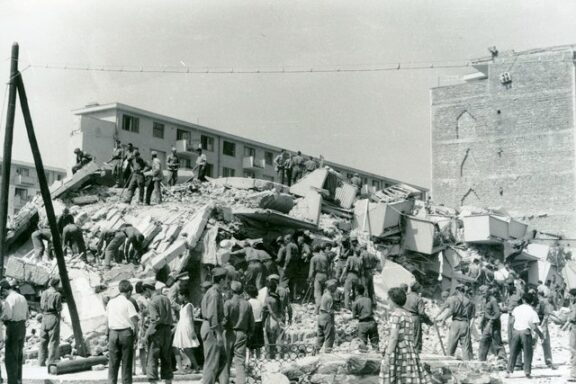 Devasted people in the ruins of the aftermath of Skopje's 1963 earthquake