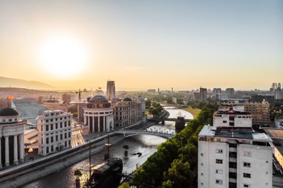 Sunrise in Skopje with Vardar River in the foreground