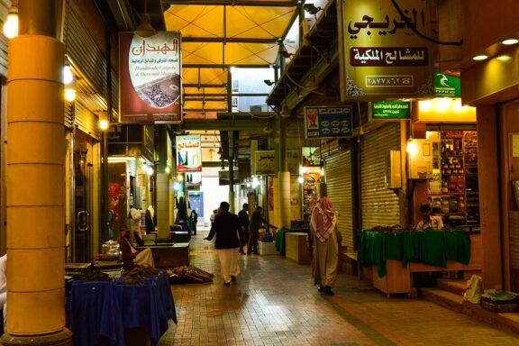 Indoor Market Alley with Shops and Visitors The Souq Al Zal, providing a captivating experience of Saudi Arabian culture and tradition