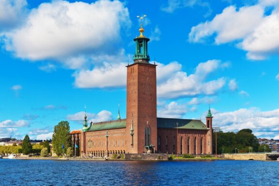 Stockholm City Hall by Waterfront The Stockholm City Hall, completed in 1923, was designed by the Swedish architect Ragnar Östberg