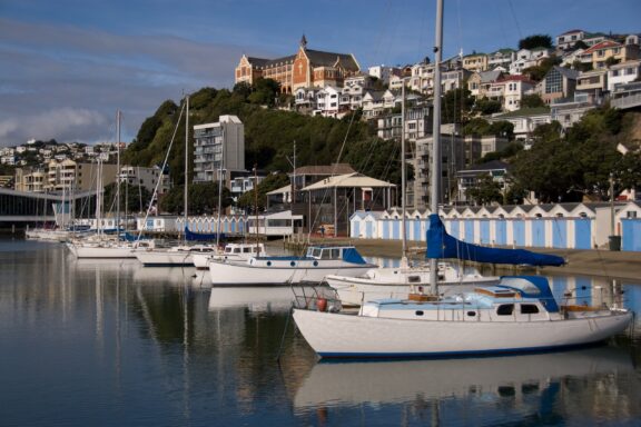Boats Docked at Wellington Harbour with Cityscape Background Yachts near the Wellington Harbour