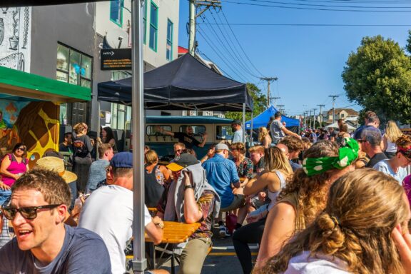 Crowded Street Scene in Wellington with People Socializing Everyday scenery in the Newtown Vintage Market in Wellington