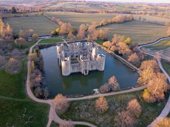 An aerial view of Bodiam Castle and its surrounding moat in England. 