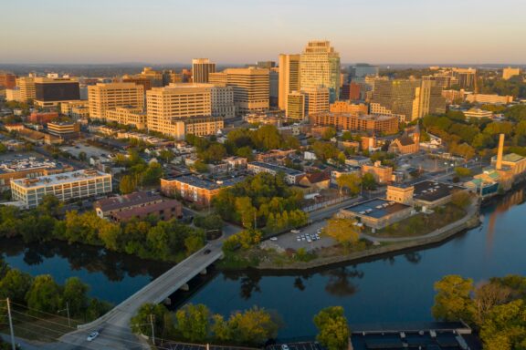 Golden Sunrise Over New Castle County Cityscape An aerial view of Wilmington, Delaware in New Castle County at sunrise.